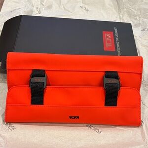 TUMI Bright Orange Organizer with Black Straps